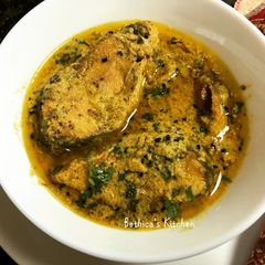 A picture of Shorshe Ilish Bengali Fish Curry.