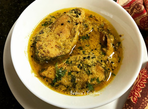 A picture of Shorshe Ilish Bengali Fish Curry.