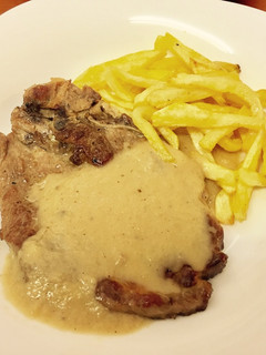 Una foto de Chuletas con salsa de cebolla y coñac