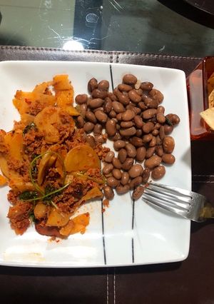 Una foto de Longaniza con papas