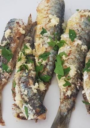 Una foto de Sardinas con ajo y perejil