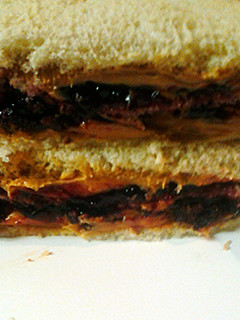A picture of Peanut butter raisins and jelly.
