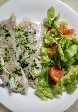 Una foto de Pescado con Provenzal