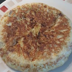A picture of Tortilla de patata with courgette. Spanish omelette.