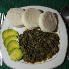 A picture of Creamy coconut vegetables with ugali.
