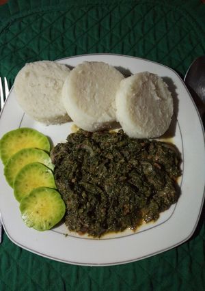 A picture of Creamy coconut vegetables with ugali.