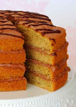 A picture of Coffee and Orange cake.