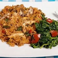 A picture of Jollof rice with spinach.