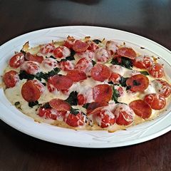 A picture of Pizza Tomatoes.