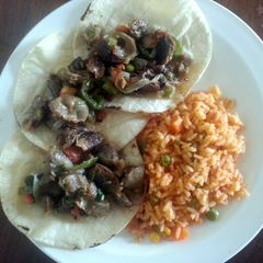 A picture of Sonia's Chicken Gizzards and Hearts Tacos.