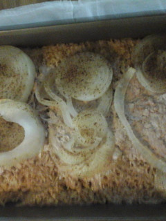A picture of Porkchops and Rice.