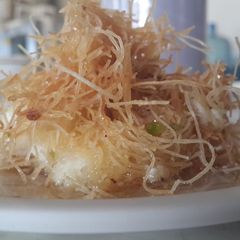 A picture of Knefe / knafe with rice pudding filling.