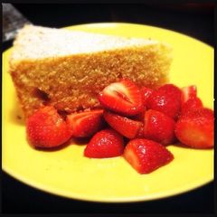 A picture of Ricotta-Orange Pound Cake with Prosecco Strawberries by Giada de Laurentiis.