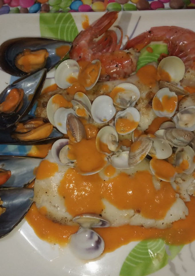 Una foto de Merluza a la marinera