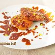 Fried crispy chicken with chocolate sauce