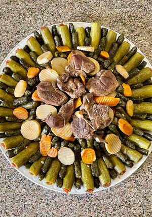 صورة لوصفة دوالي وكوسا بحشوة البرغل 😋😋