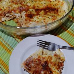 A picture of Baked Macaroni in white sauce.