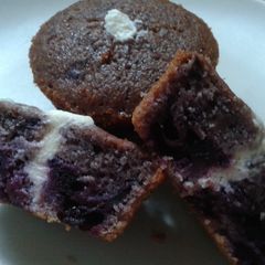 A picture of Blueberry muffins with cream cheese filling.