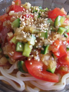 A picture of Chinese Style Udon Noodles with Chilled Tomatoes.