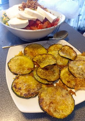 Una foto de Rodajas de Zapallo italiano grillado al parmesano