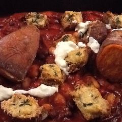 A picture of Smoked baked beans w cheesy croutons and sweet potato.