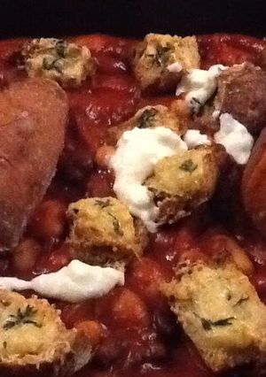 A picture of Smoked baked beans w cheesy croutons and sweet potato.