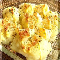 A picture of Grilled Cauliflower with Herbs & Cheese.