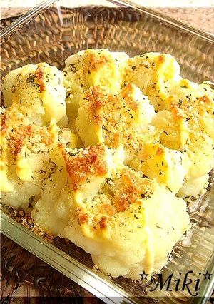 A picture of Grilled Cauliflower with Herbs & Cheese.
