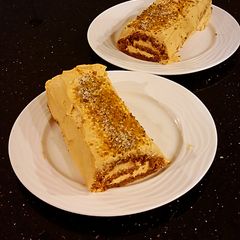 A picture of Gingerbread Cake Roll with Pumpkin Spice Cream.