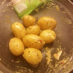 A picture of Garlic mayo baby potatoes in chimichurri.