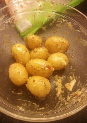 A picture of Garlic mayo baby potatoes in chimichurri.