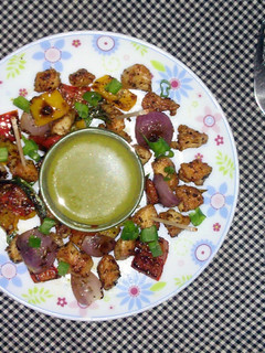 A picture of Chicken and Veggies stir fry.