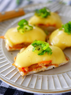 A picture of Chicken With Kimchi and Cheese.
