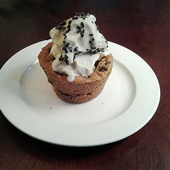 A picture of Chocolate Chip Cookie Cups, Filled with Ice Cream.