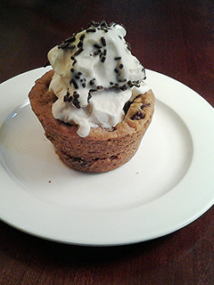 A picture of Chocolate Chip Cookie Cups, Filled with Ice Cream.