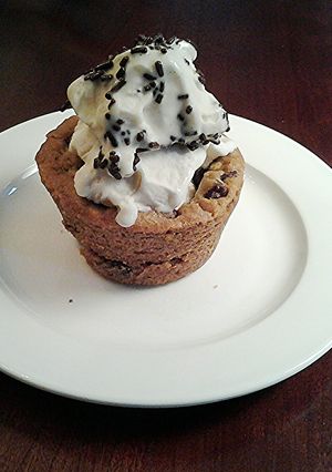 A picture of Chocolate Chip Cookie Cups, Filled with Ice Cream.