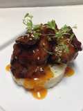 crispy pig cheeks with spicy pineapple,orange glaze and thai basil,lemon rice