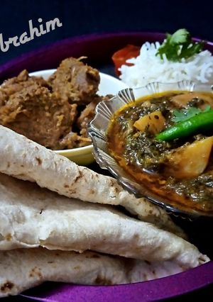 A picture of Bihari boti, Aloo palak, Plain Rice and Chapati.