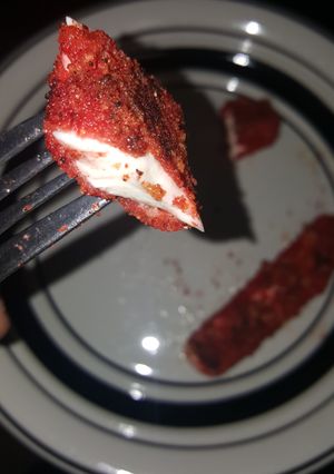 A picture of Hot cheeto mozzarella sticks (CheezOs).