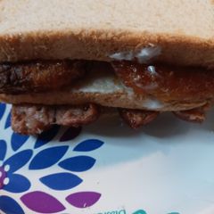 A picture of Sausage and Hashbrown Sandwich.