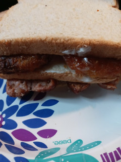 A picture of Sausage and Hashbrown Sandwich.