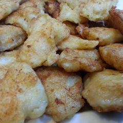 A picture of Pan fried fish nuggets.