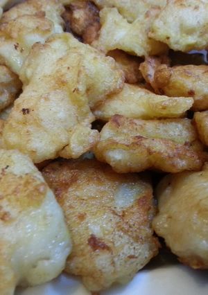A picture of Pan fried fish nuggets.