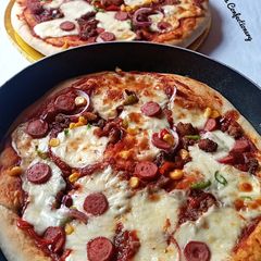 A picture of Suya Pizza.