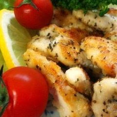 A picture of With Lemon Chicken Breast Grilled with Basil and Cheese.
