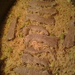 A picture of Basmati rice in beef stock.