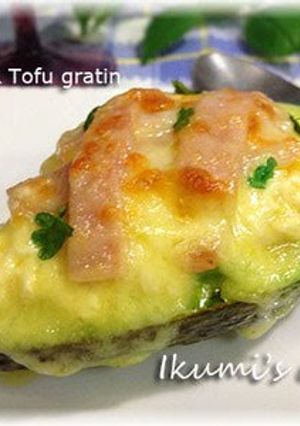 A picture of Avocado au Gratin with Tofu, Miso and Cheese.