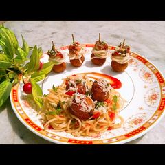 A picture of Veg Meatballs with Spaghetti.
