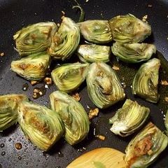 A picture of Garlic Sautéed Baby Artichokes.