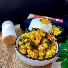 A picture of Banana Stem stir fry with mustard seeds.